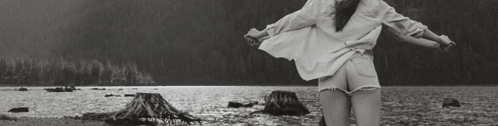 Couple during their engagement session at Ralph River Campground on Buttle Lake by Latitude 49 photography