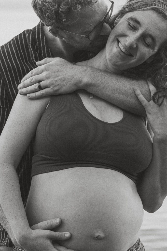 Expecting mother on the beach in Comox by Latitude 49 photography