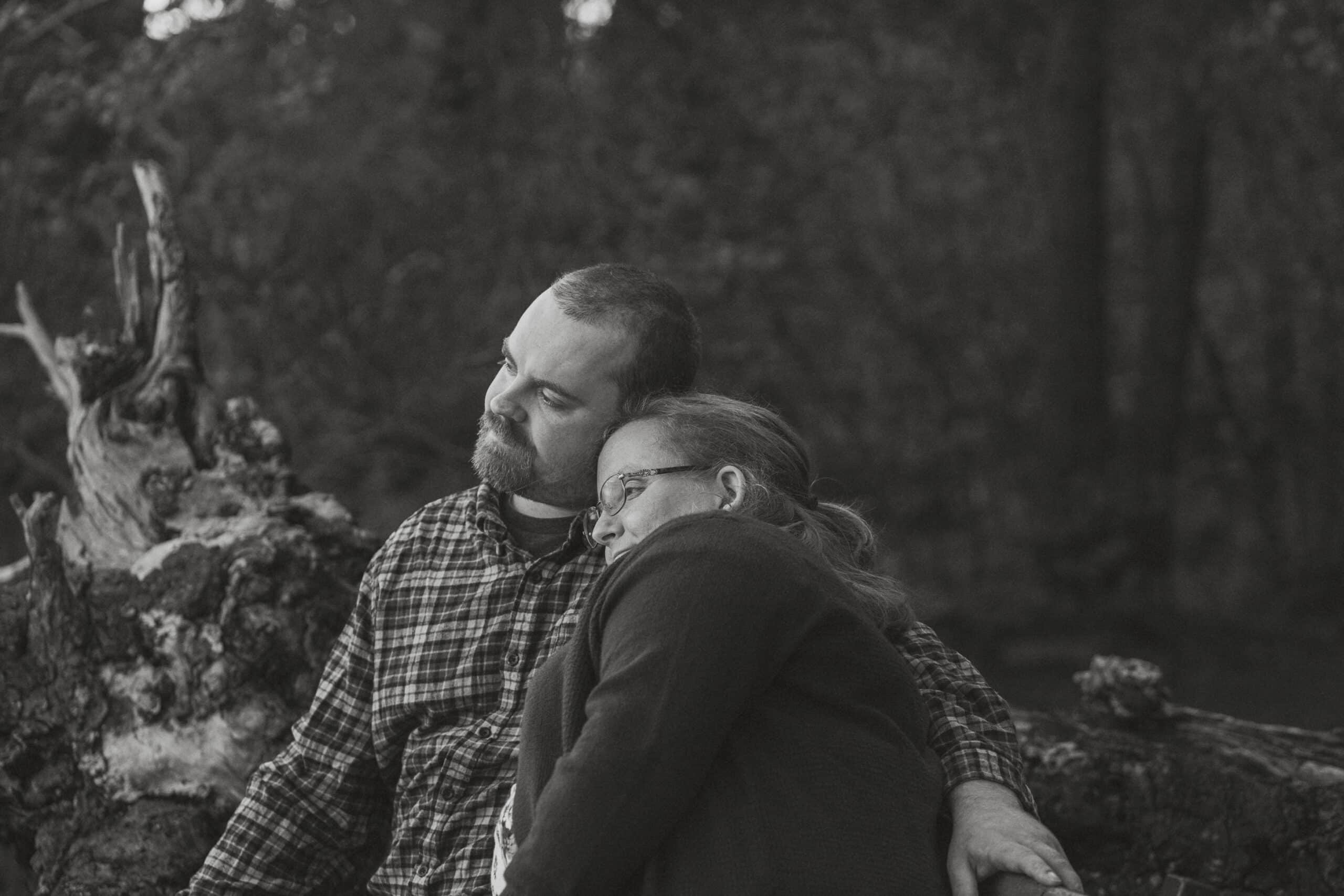 Couple in the forest during their engagement session on the oyster river trail by latitude 49 photography