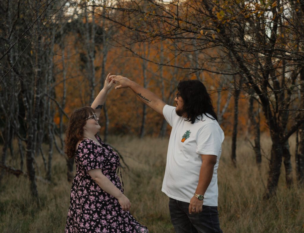 Couple during their golden hour engagement session near Kye bay in Comox by latitude 49 photography