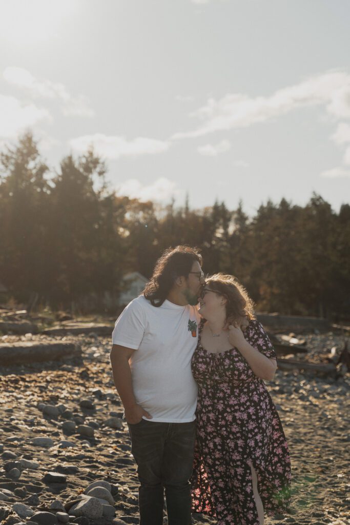Couple during their golden hour engagement session at Kye bay in Comox by latitude 49 photography