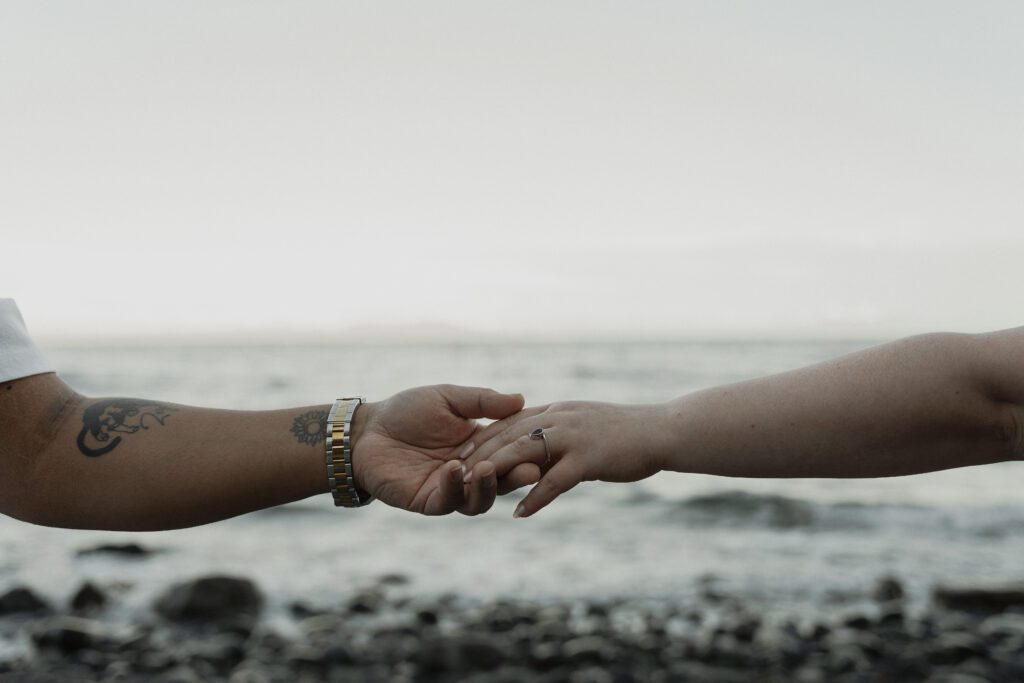 Couple during their golden hour engagement session at Kye bay in Comox by latitude 49 photography