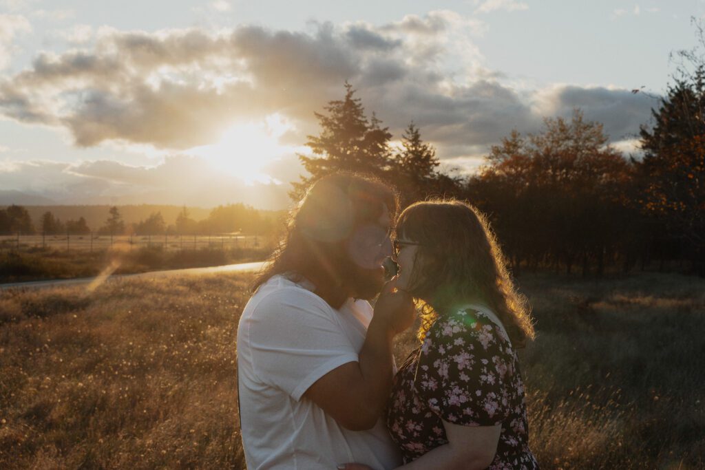Couple during their golden hour engagement session near Kye bay in Comox by latitude 49 photography