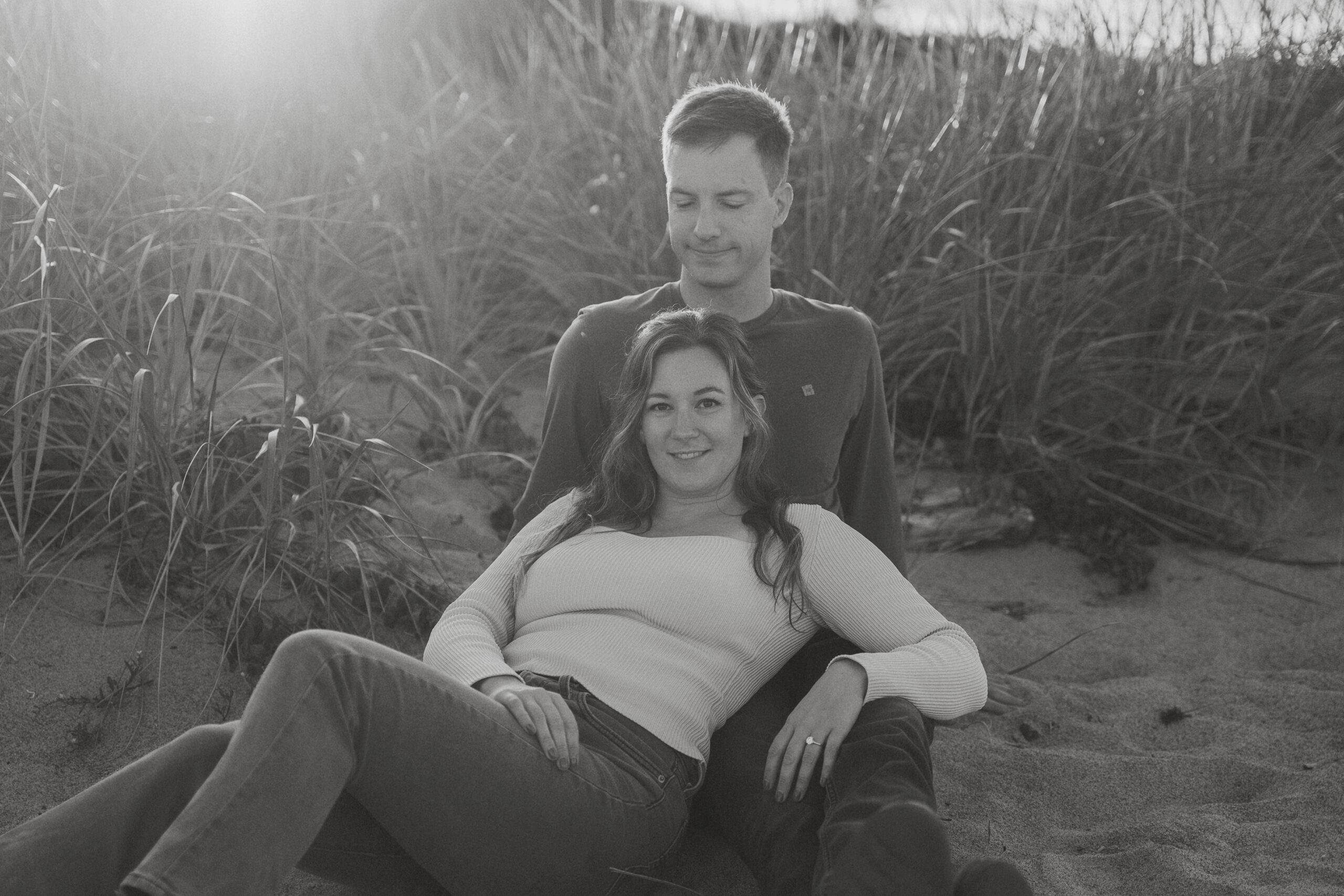 Kathryn and Airell during their engagement session at Airforce beach by Latitude 49 photography