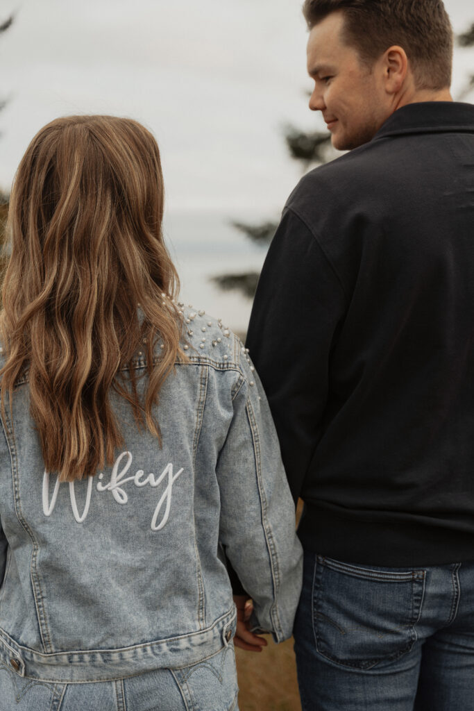Couple during their engagement session near Kye Bay in Comox by Latitude 49 Photography