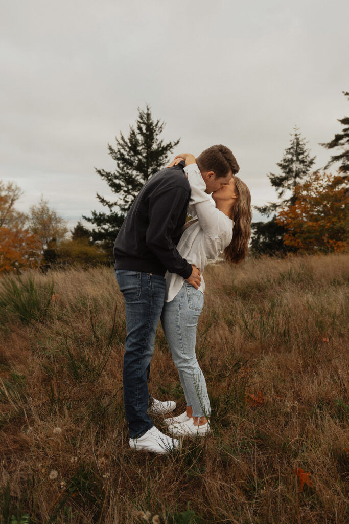 Couple during their engagement session near Kye Bay in Comox by Latitude 49 Photography