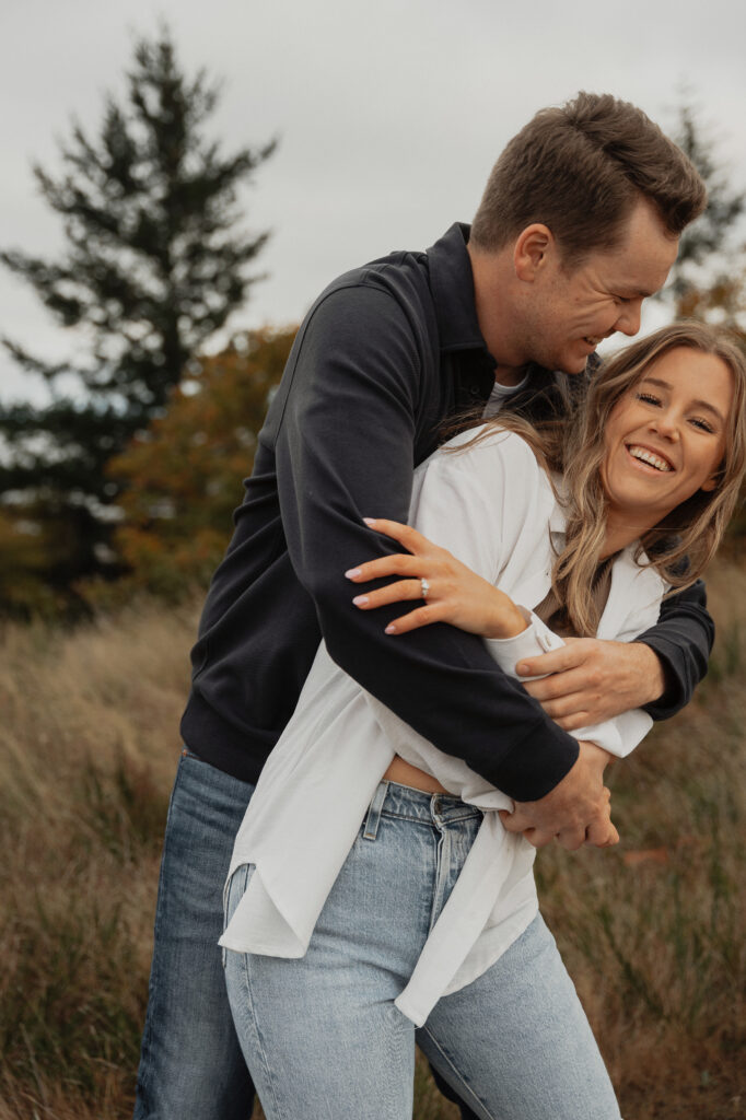Couple during their engagement session near Kye Bay in Comox by Latitude 49 Photography