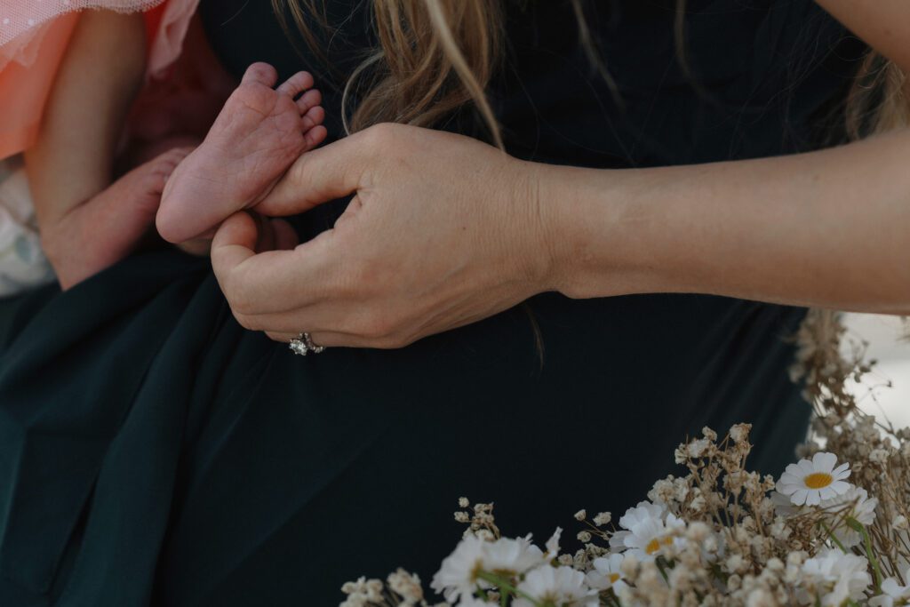 capturing the little details during a new mom's motherhood session