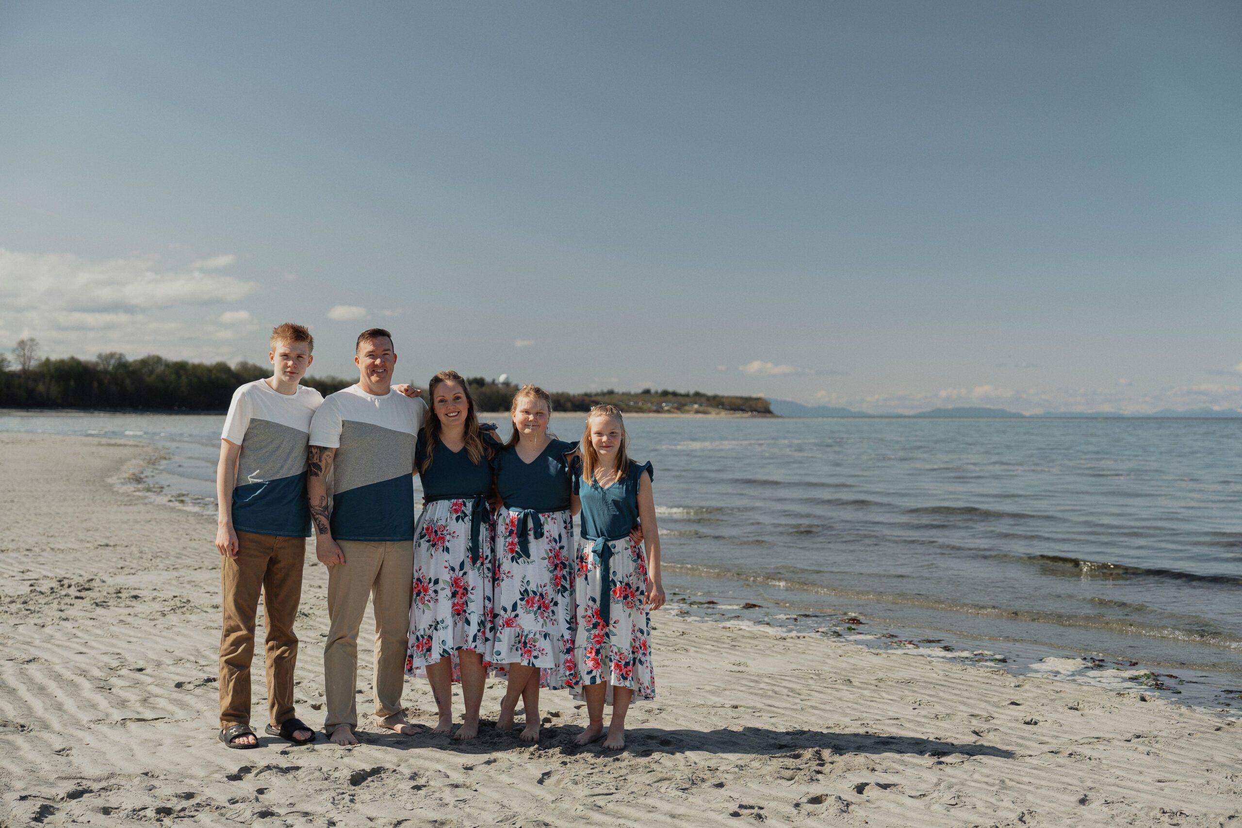 Family and Engagement session at the beach in Kye bay in preparation for their destination wedding in Mexico by Latitude 49 Photography