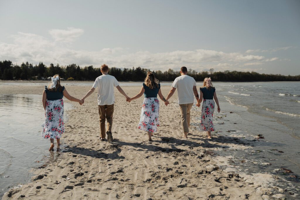 Family and Engagement session at the beach in Kye bay in preparation for their destination wedding in Mexico by Latitude 49 Photography