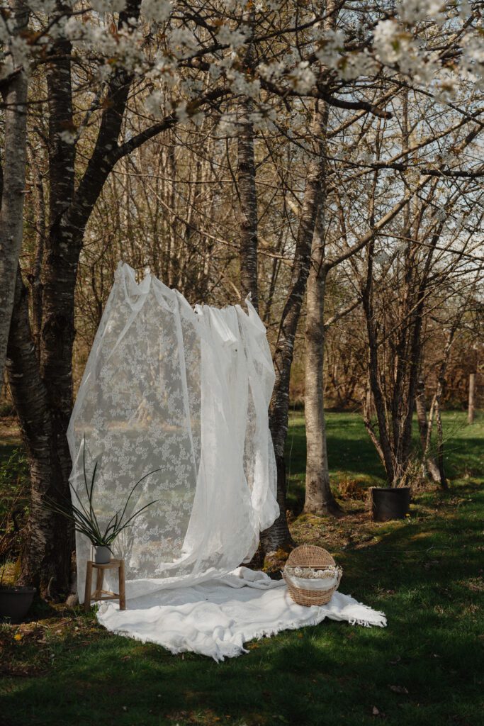 Natural light motherhood mini session in Comox Valley backyard setting