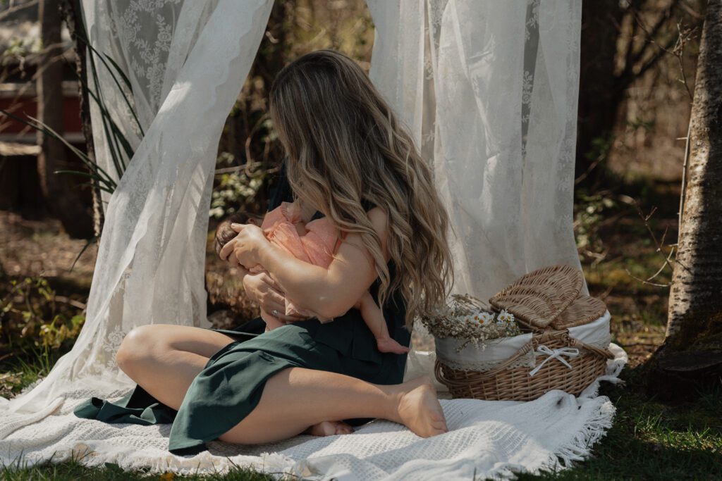 Tender moment between mother and baby captured naturally by Latitude 49 Photography