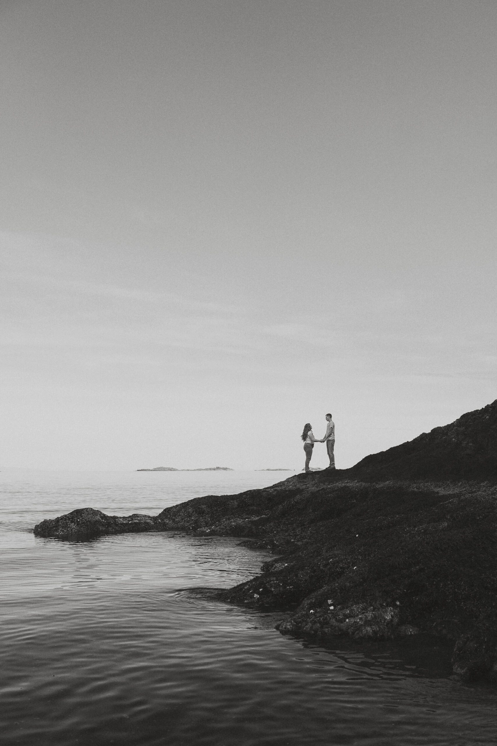 couple during their engagement session at Es-hw Sme~nts Community Park in Nanoose bay by Latitude 49 Photography