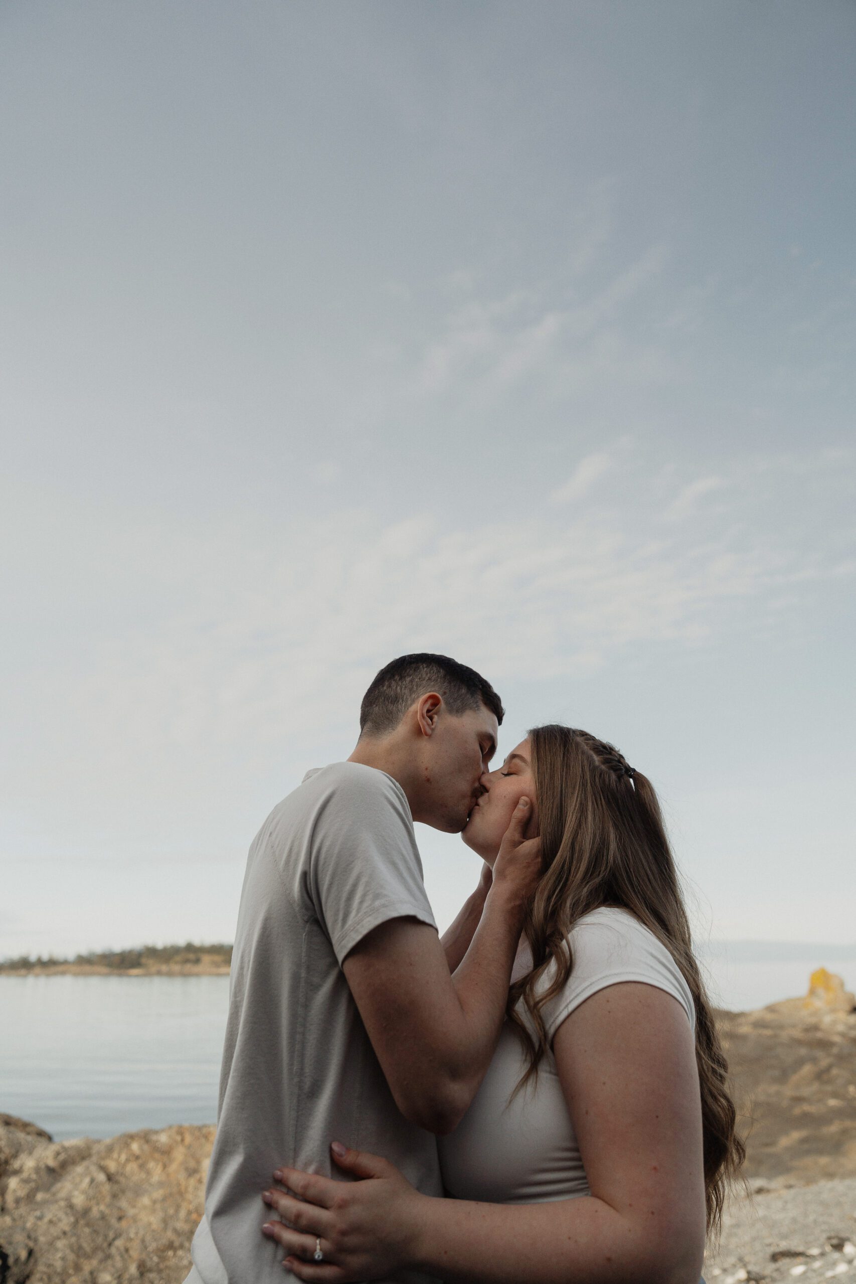 couple during their engagement session at Es-hw Sme~nts Community Park in Nanoose bay by Latitude 49 Photography