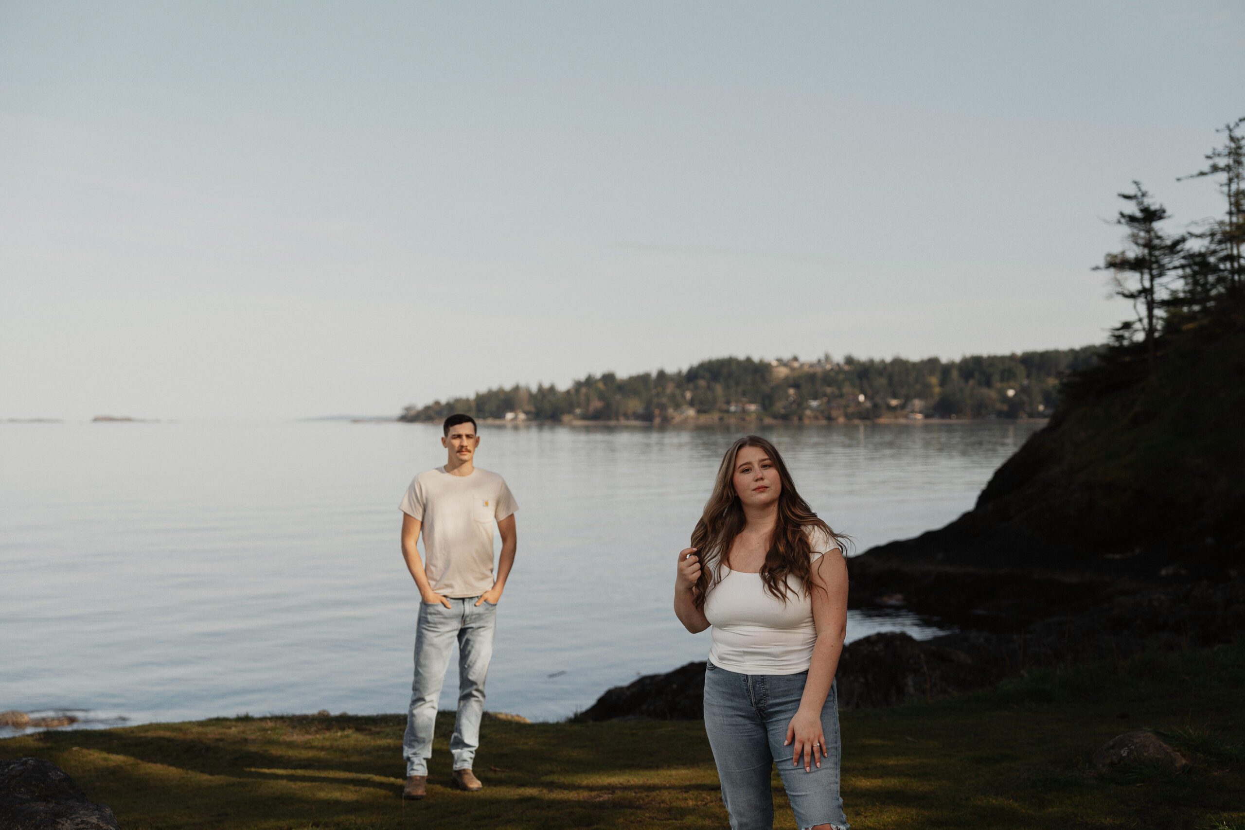 couple during their engagement session at Es-hw Sme~nts Community Park in Nanoose bay by Latitude 49 Photography