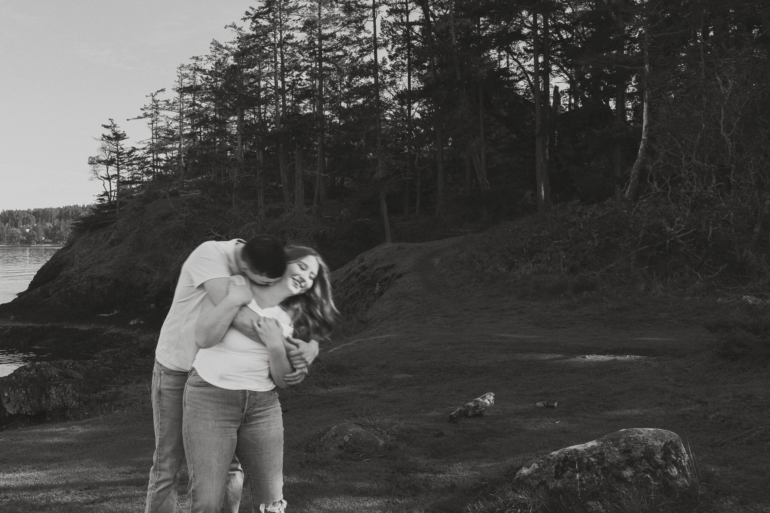 couple during their engagement session at Es-hw Sme~nts Community Park in Nanoose bay by Latitude 49 Photography