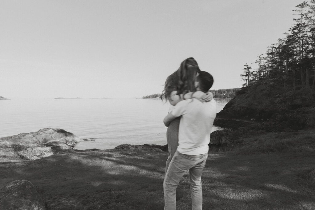 couple during their engagement session at Es-hw Sme~nts Community Park in Nanoose bay by Latitude 49 Photography