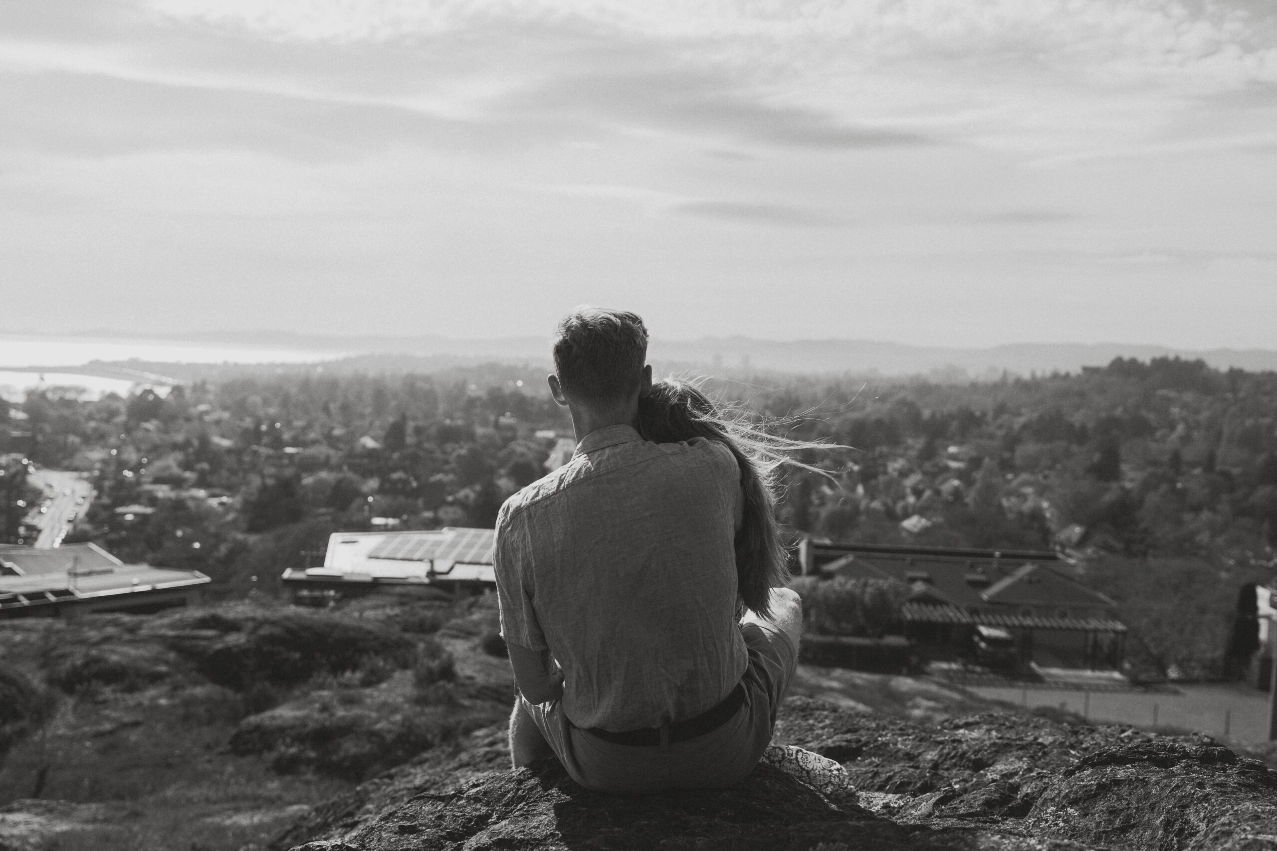 Couple during their engagement session overlooking Victoria at the Gonzales Observatory by latitude 49 photography