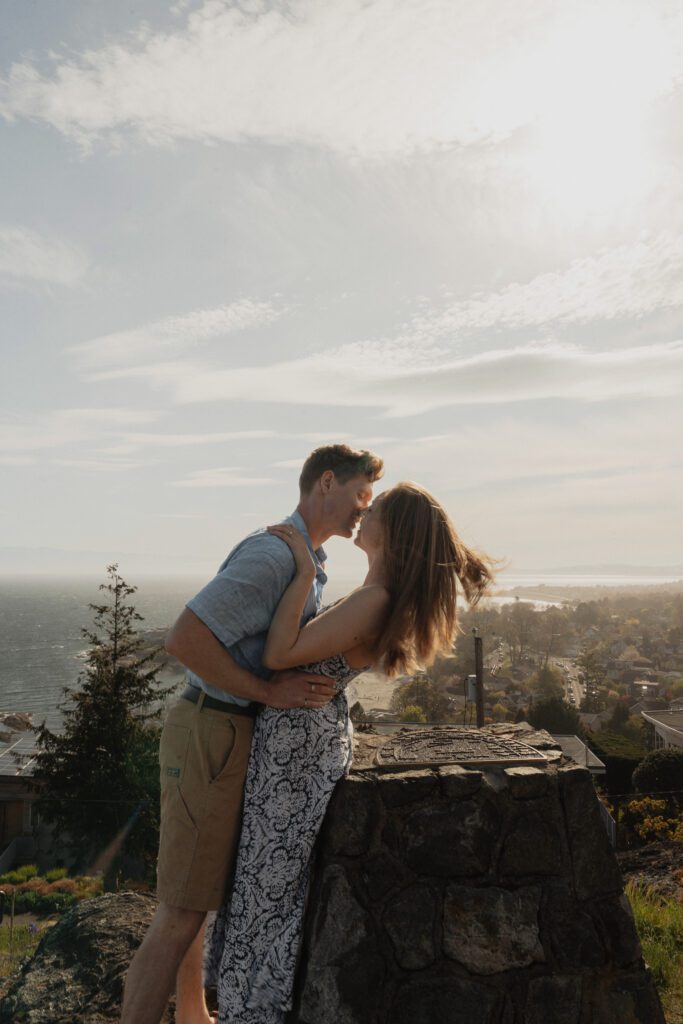 Couple during their engagement session overlooking Victoria at the Gonzales Observatory by latitude 49 photography