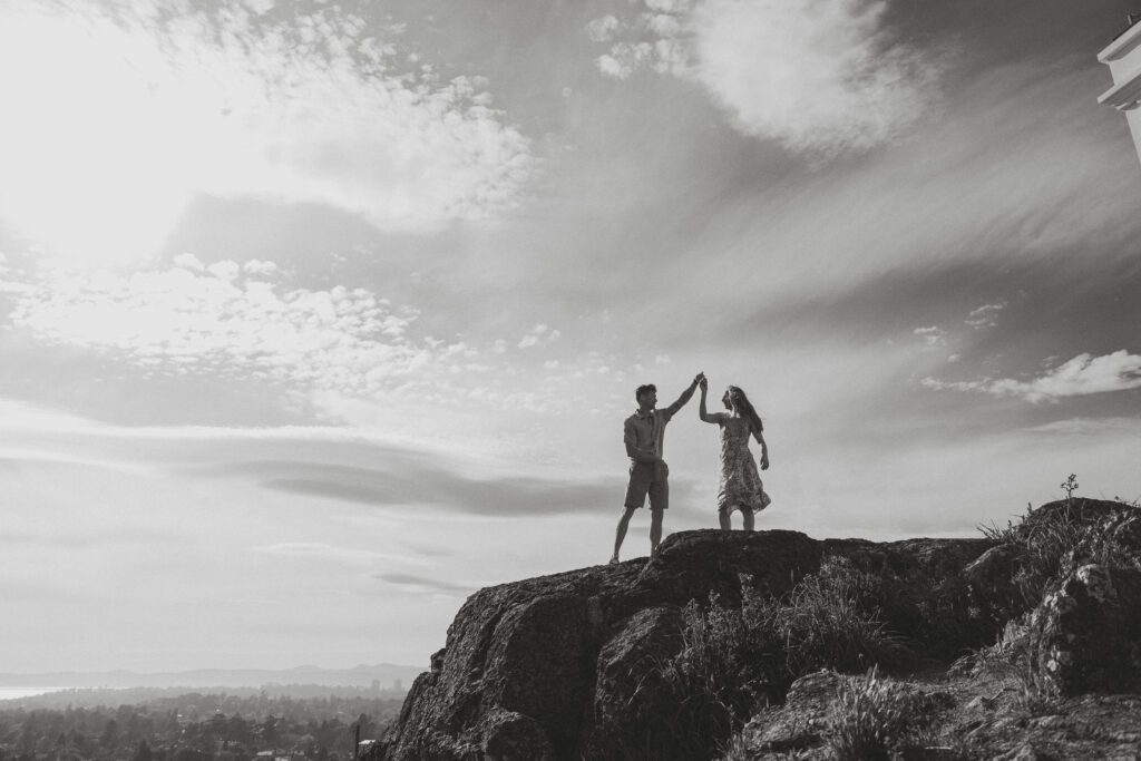 Couple during their engagement session overlooking Victoria at the Gonzales Observatory by latitude 49 photography