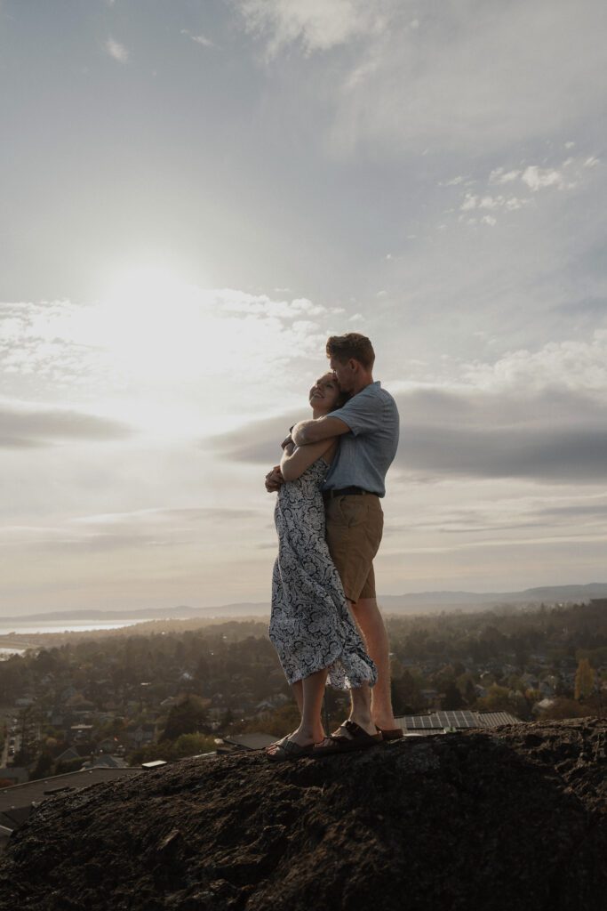 Couple during their engagement session overlooking Victoria at the Gonzales Observatory by latitude 49 photography