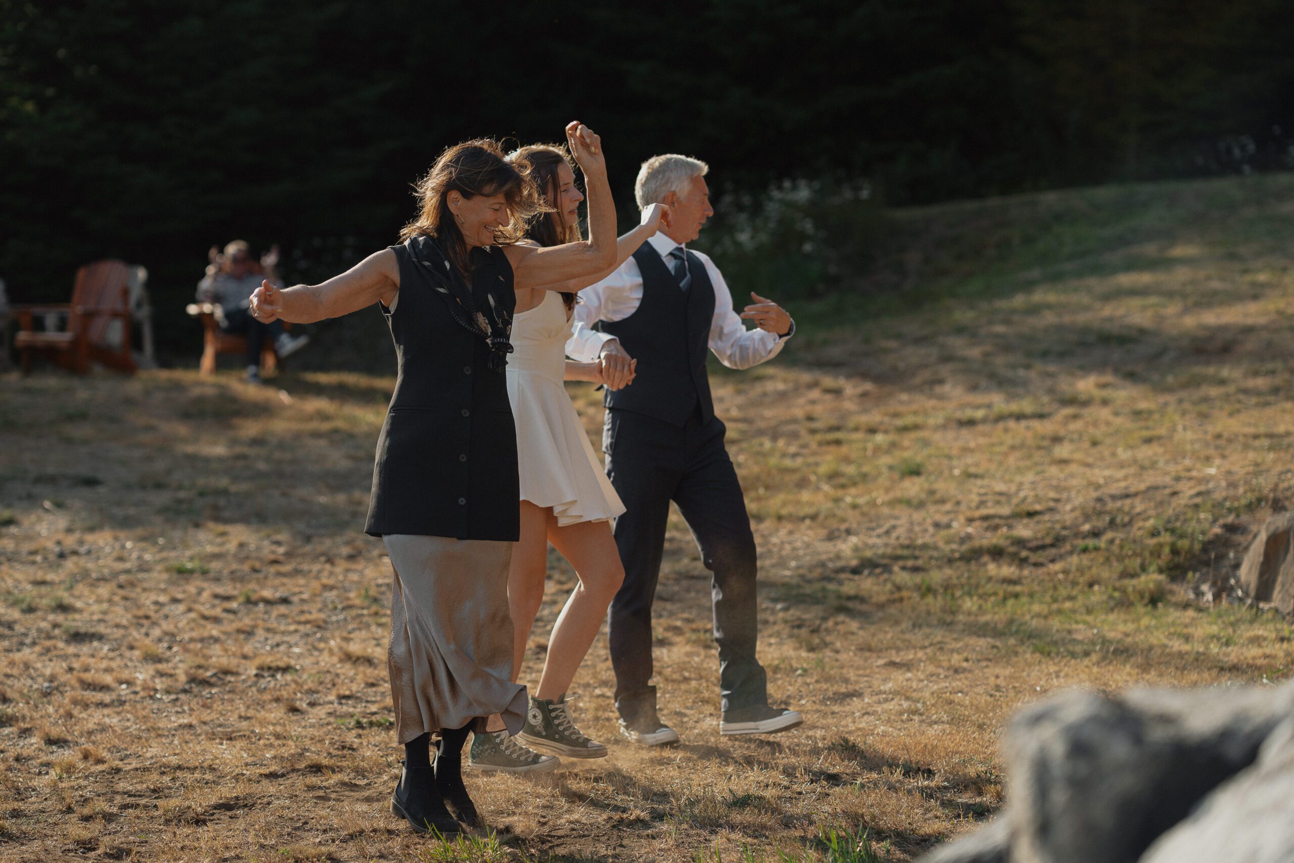 Family dance during a back yard wedding at Forbidden Plateau in the Comox Valley by Latitude 49 Photography