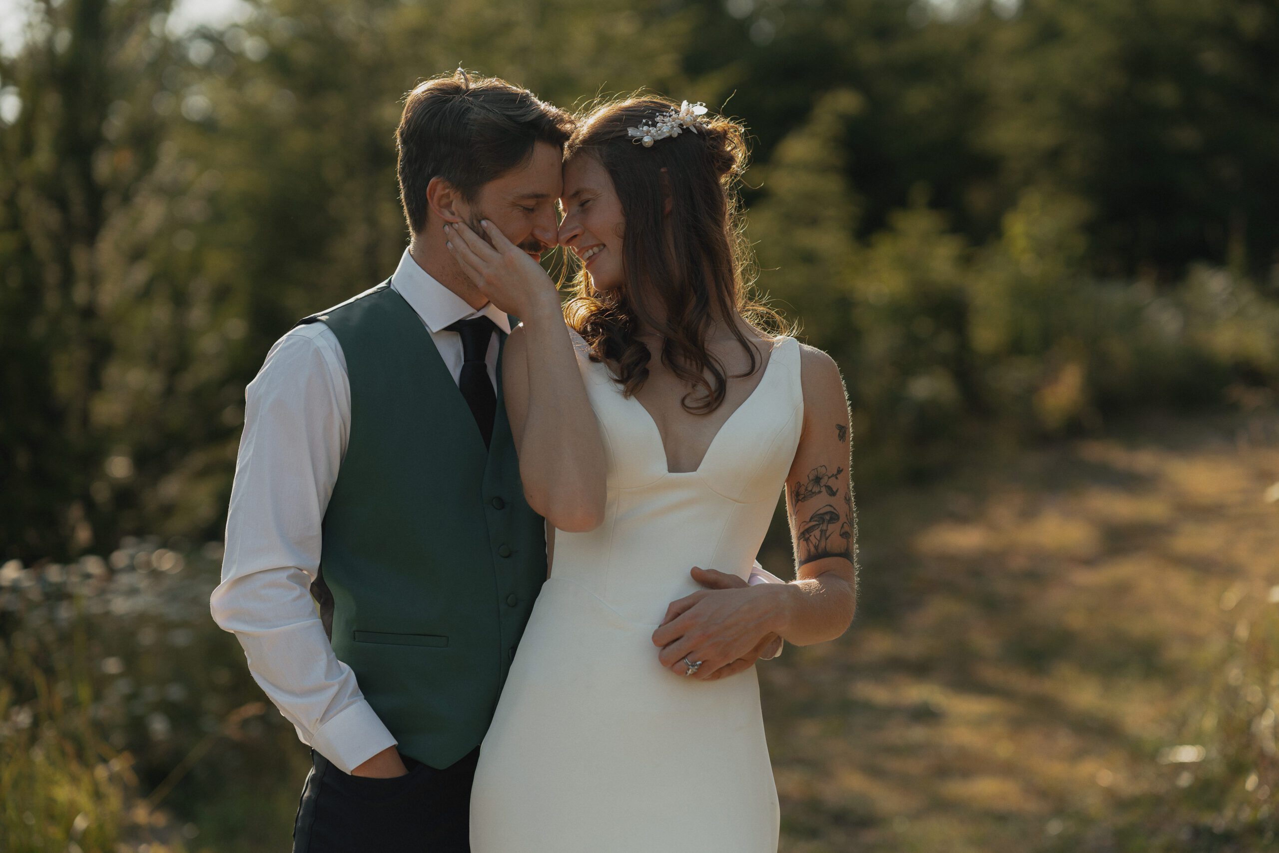 Bride and groom in editorial style pose during golden hour wedding portraits in the Comox Valley by Latitude 49 photography
