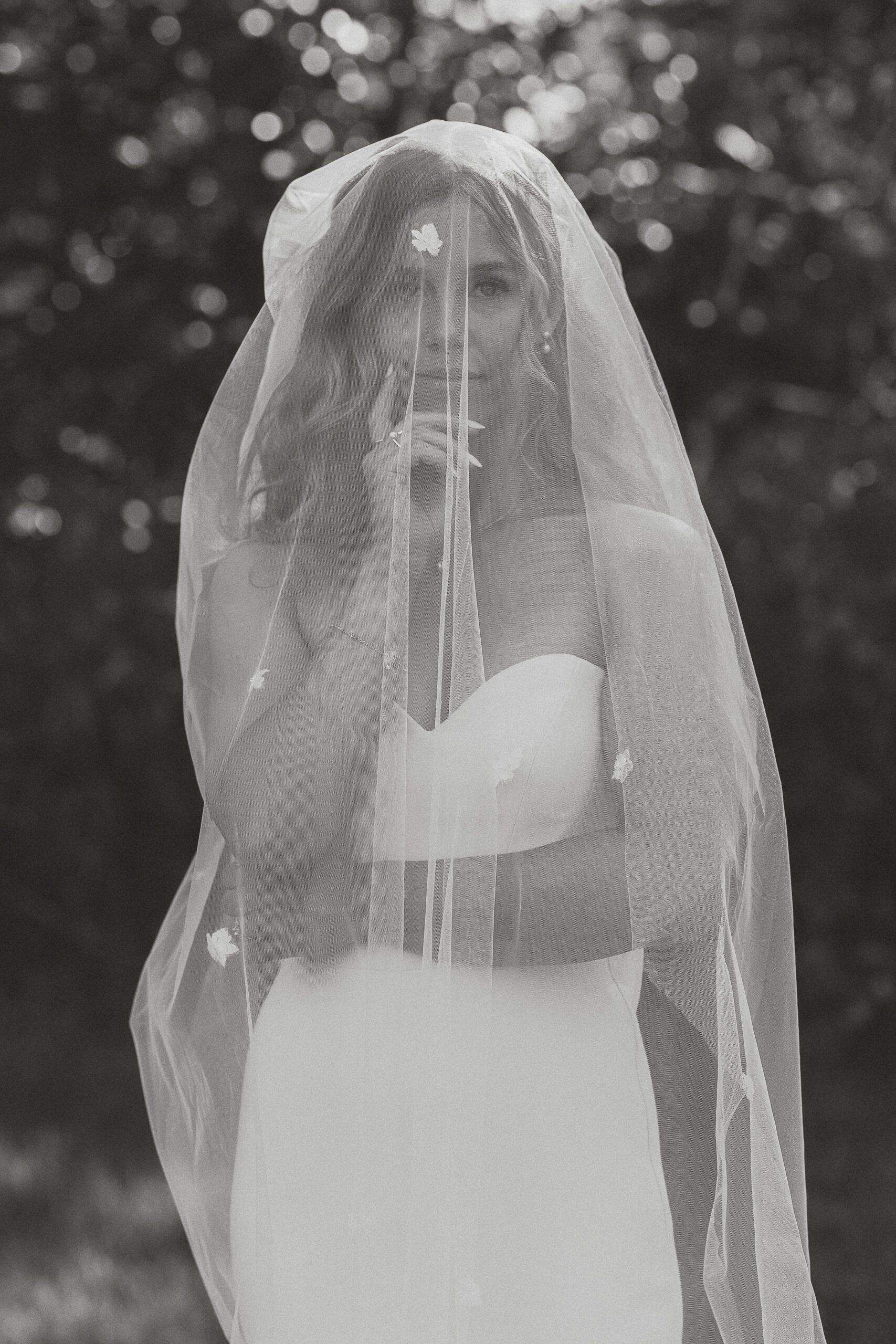 Bride under her veil during her wedding portraits in comox by latitude 49 photography