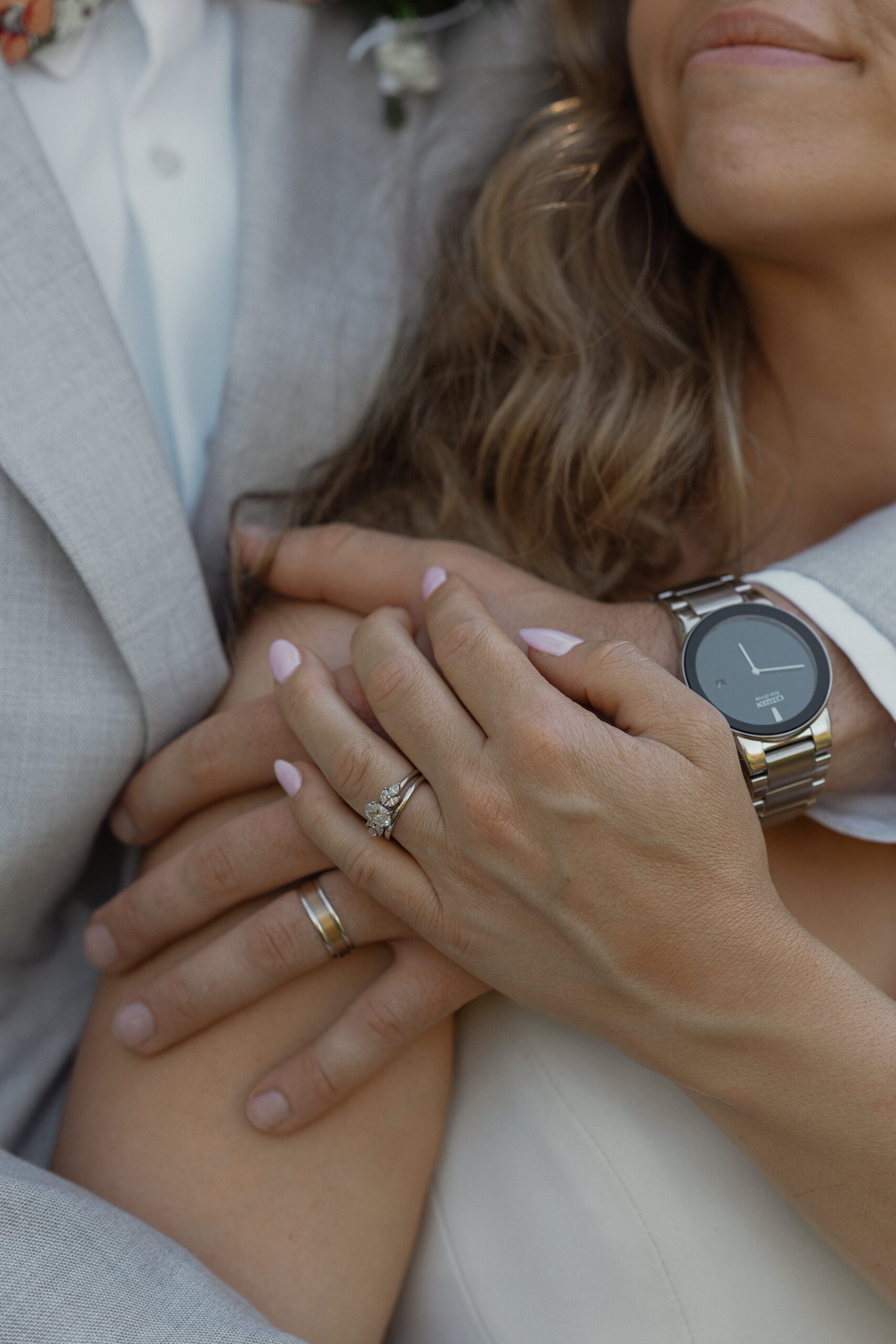 Bride and grooms hands during their wedding portraits by Latitude 49 photography in Comox