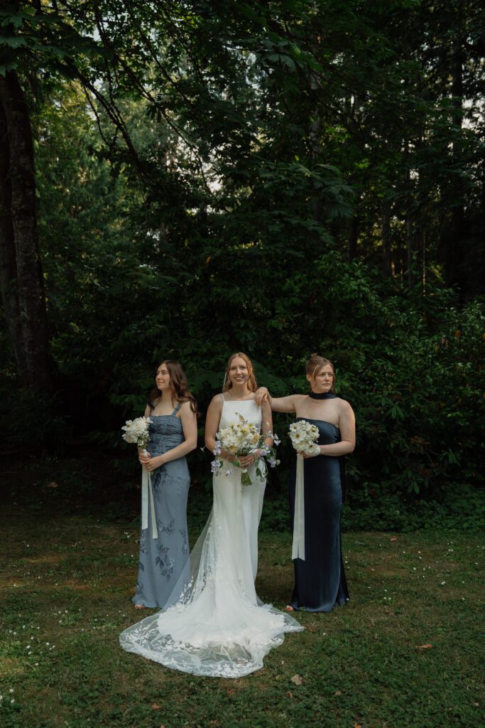 Bride and her wedding party on her wedding day at heritage acres in saanichton by latitude 49 photography