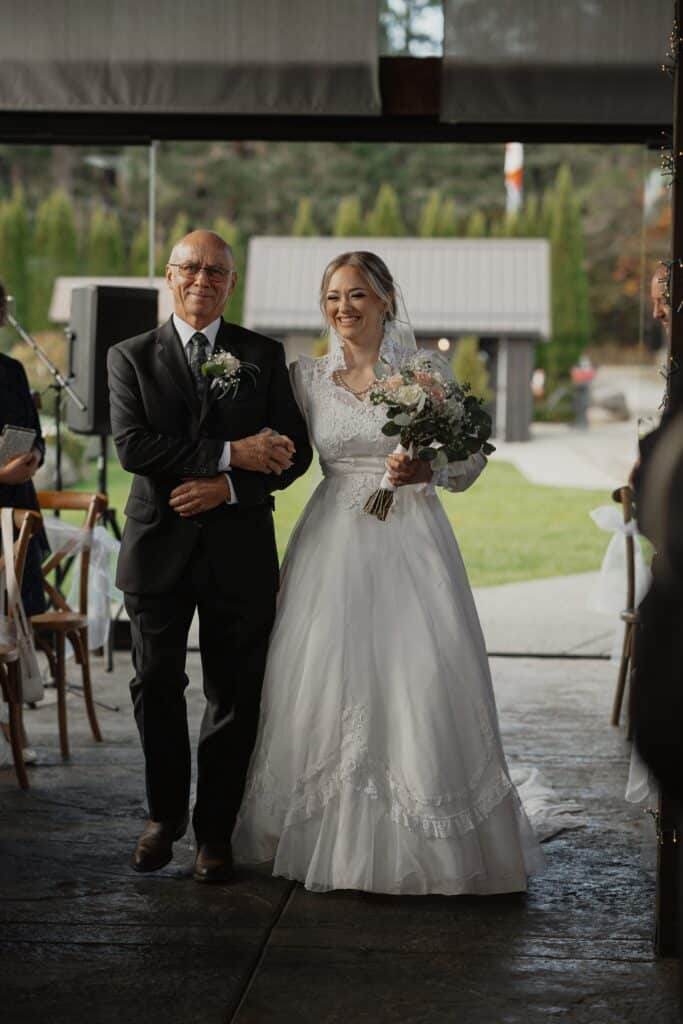 bride and her dad walking down the isle