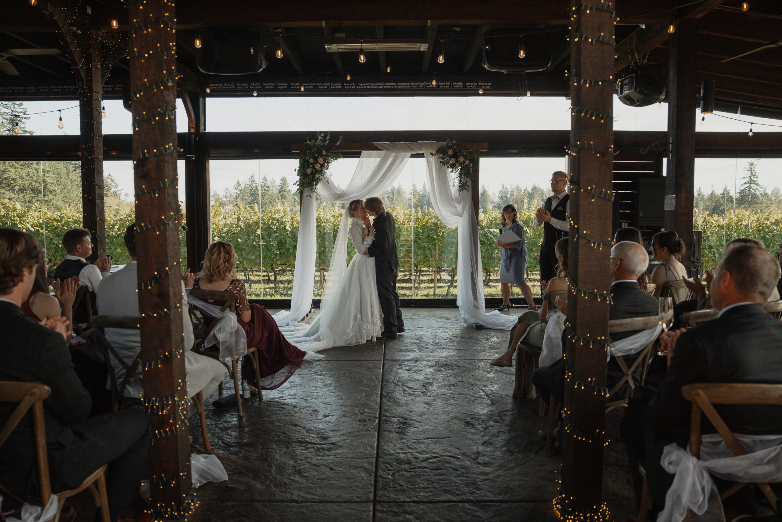 First kiss at 40 Knots winery in Comox by Latitude 49 Photography