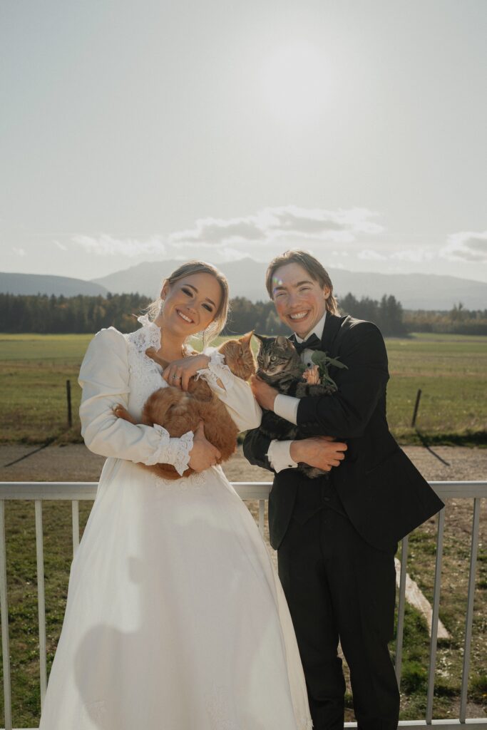 bride and groom with their cats
