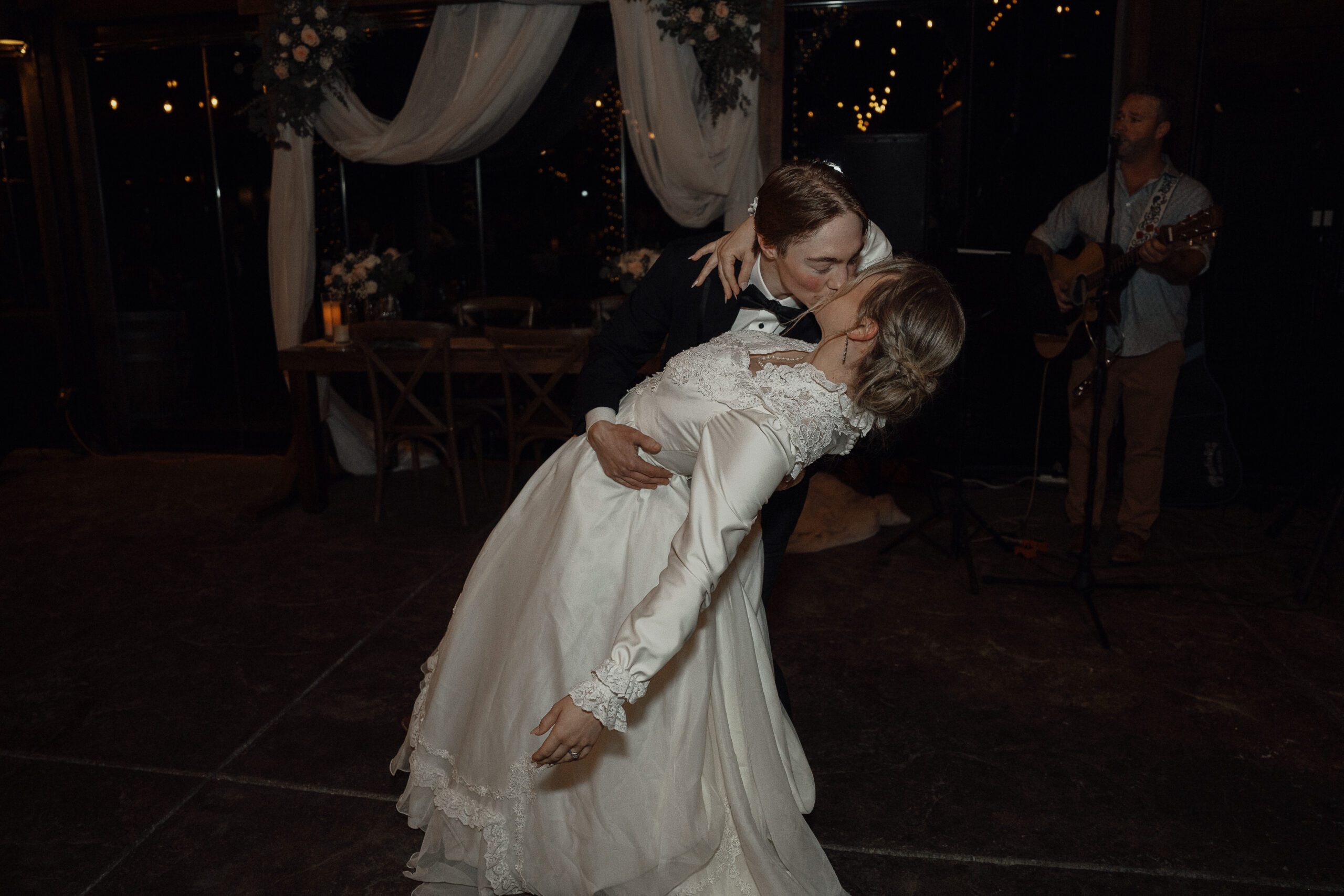 Bride and groom during their first dance at there wedding at 40 Knots winery in Comox by Latitude 49 photography