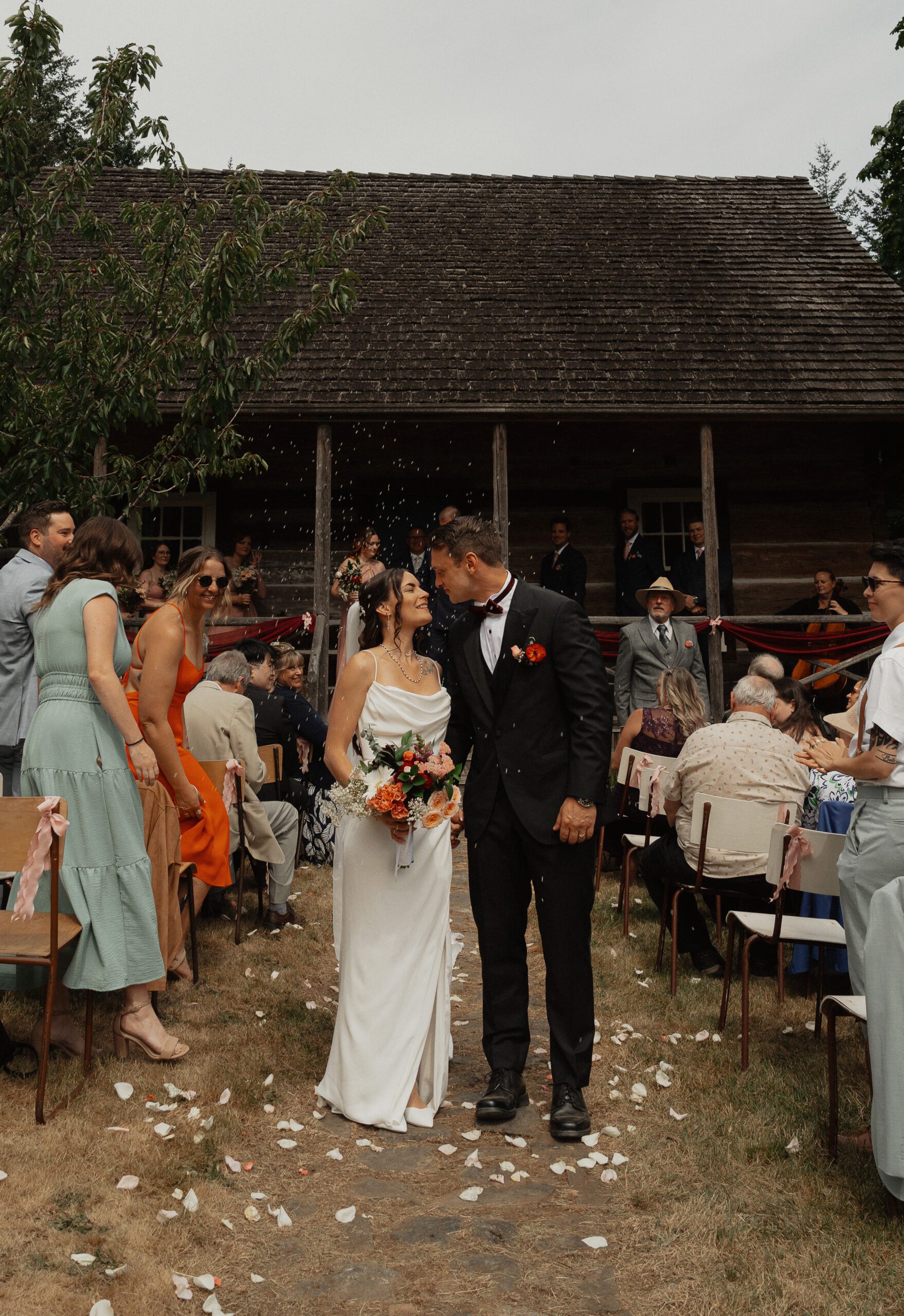 Bride and groom walking down the aisle after being married at Caleb Pike Heritage Park in Victoria
