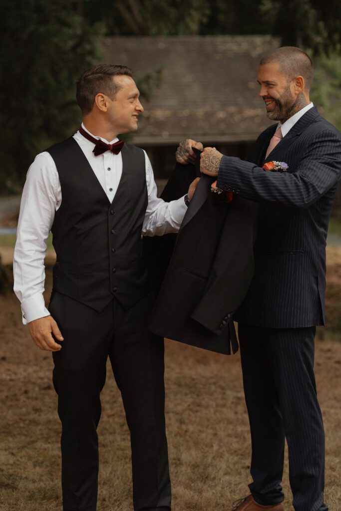 groom and groomsman during getting ready portraits at Caleb Pike Heritage Park in Victoria by Latitude 49 Photography
