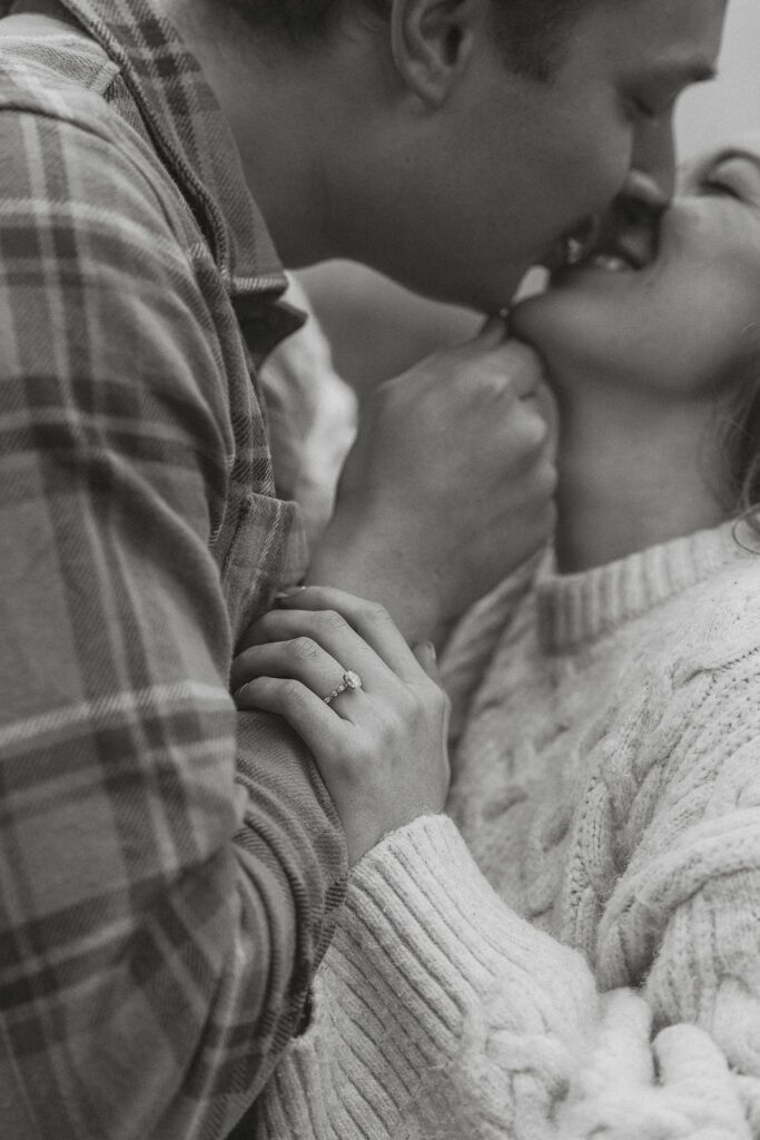 Connor and Liz sharing a kiss during their fall engagement session at the Trestle Bridge in Campbell River.