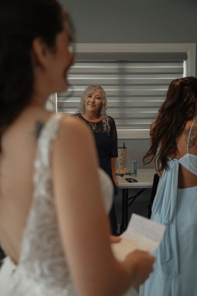 Mom looking at daughter during getting ready portraits