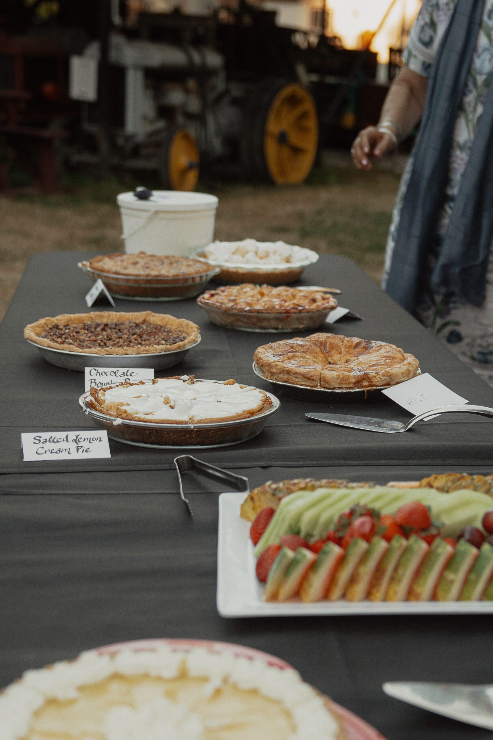 Pies as a wedding dessert over cake cutting at Heritage Acres in Saanichton by Latitude 49 Photography